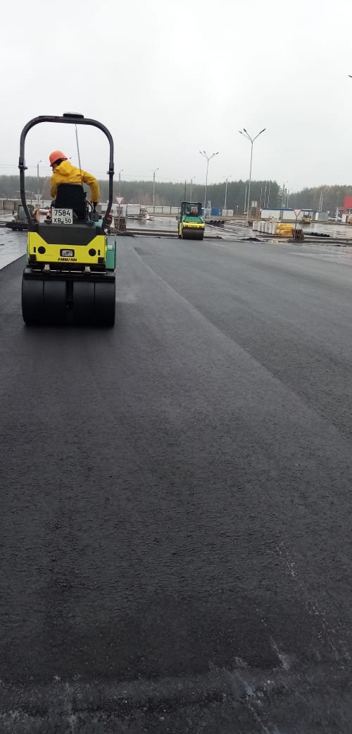 укладка асфальта; асфальтирование; асфальтировка